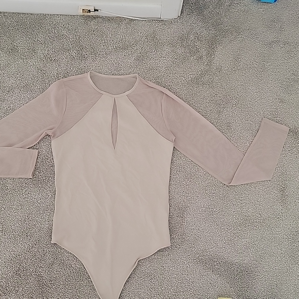 Cream or taupe body suit